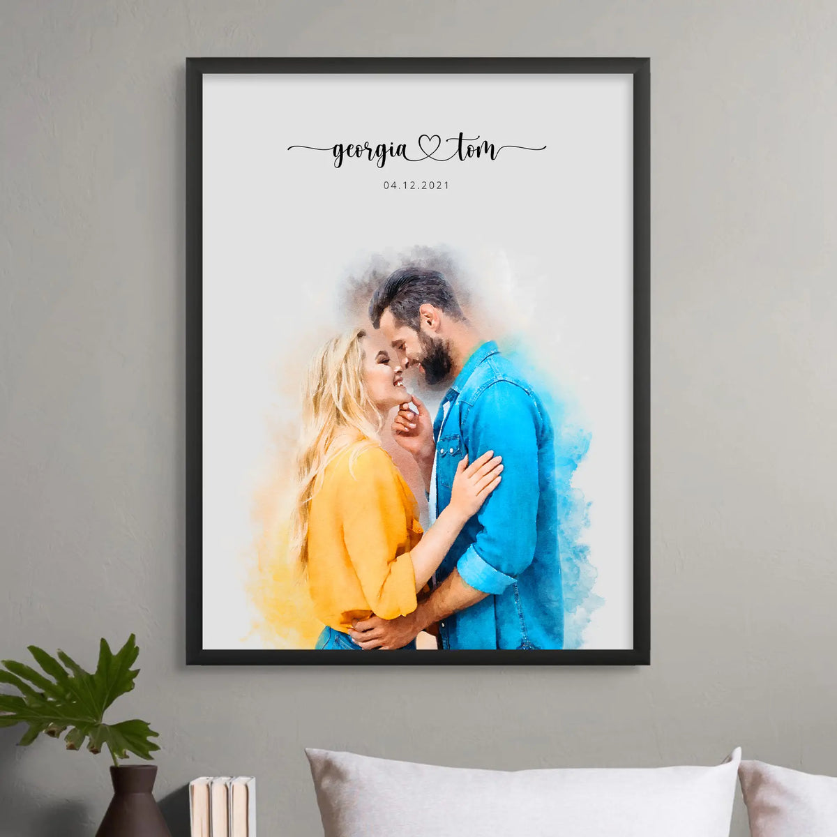 Watercolor-style portrait of a couple embracing, the woman in a yellow top and the man in a blue shirt, in a black frame