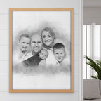 Sketch-style portrait of two adults, two boys and a baby, in a light wood frame on a wall