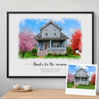 Watercolor-style portrait of a blue two-story house between blossom trees, framed in matte black, beside its photo