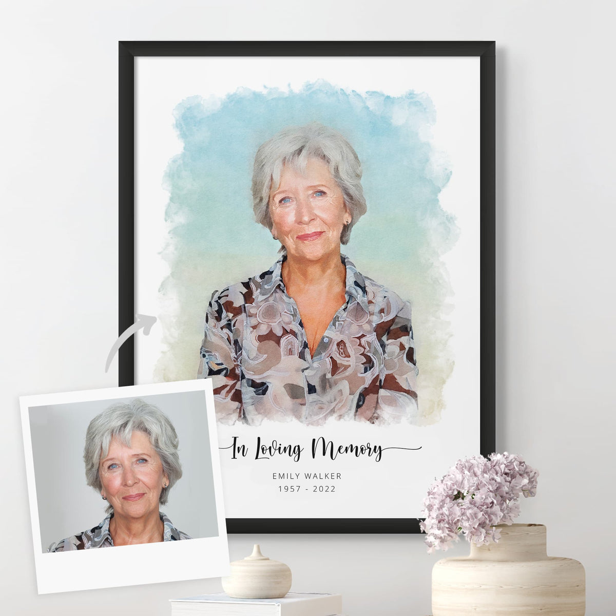 Watercolor-style memorial portrait of a silver-haired woman, 'In Loving Memory' printed below, framed in matte black