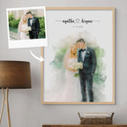 Watercolor-style portrait of a bride and groom side by side, in a light oak frame, beside its reference photo